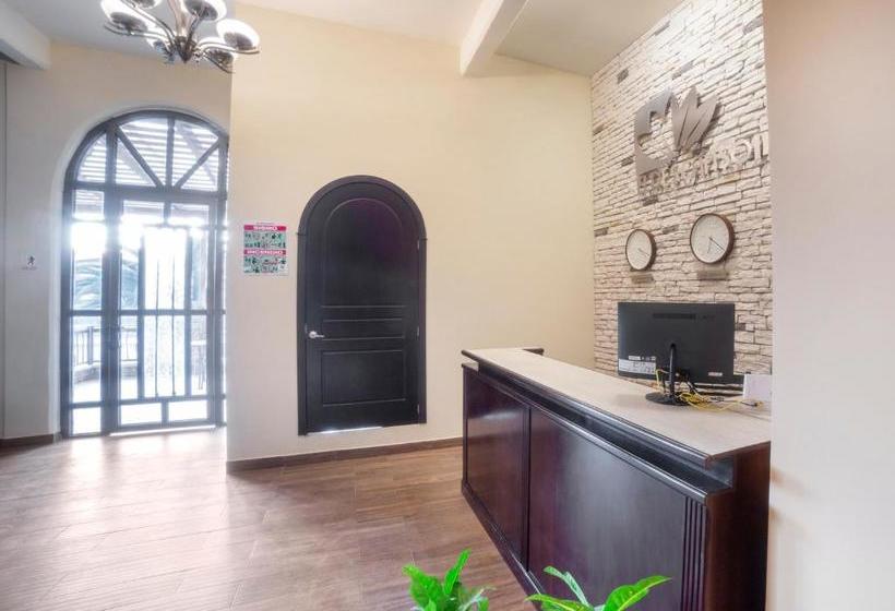 Отель Capital O Descanso Inn