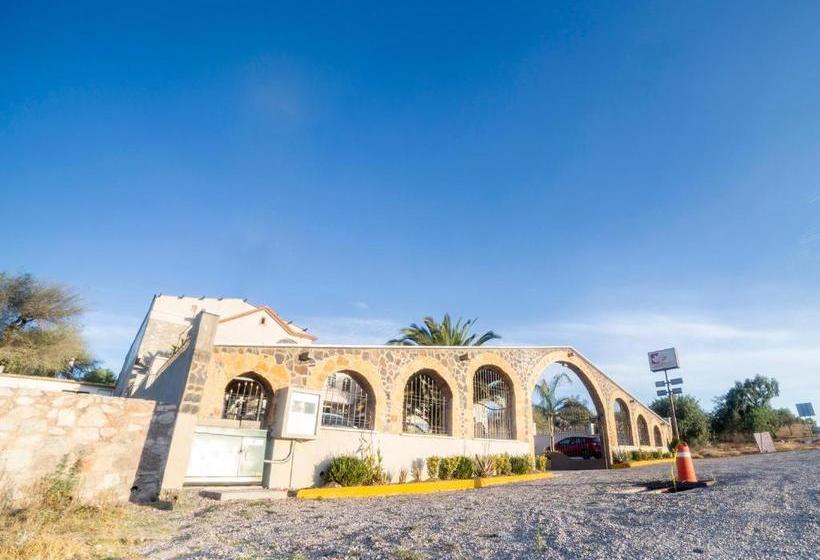 Отель Capital O Descanso Inn