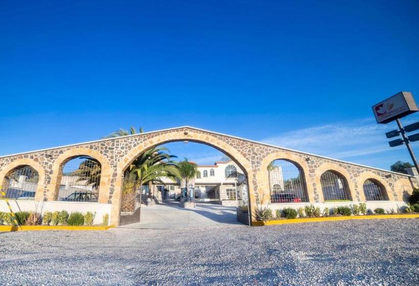 Отель Capital O Descanso Inn