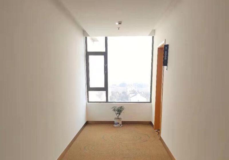 هتل Greentree Inn Wuxi Huishan District Yangshan Town Jiayang Life Plaza Business