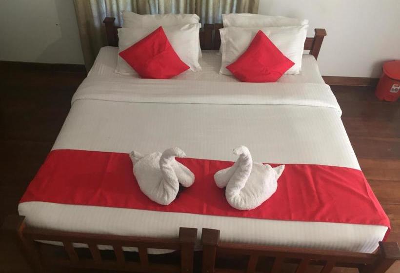 פנסיון Mangosteen Holidays