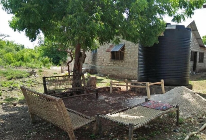 تختخواب و صبحانه Wasini Raha Stay