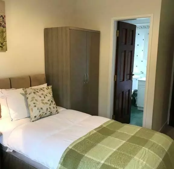 تختخواب و صبحانه Ros Dún House