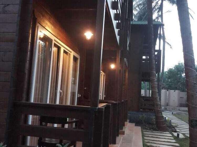 酒店 Vinnca Woodvillas Beachfront Resort
