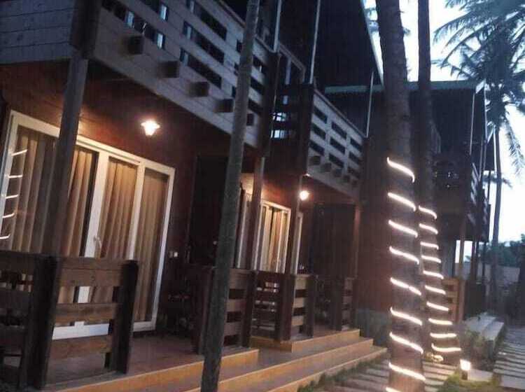 酒店 Vinnca Woodvillas Beachfront Resort