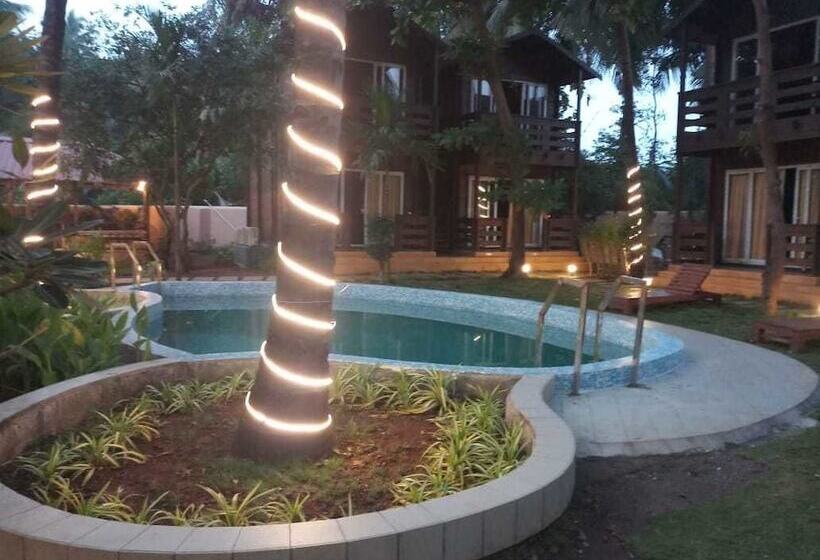 酒店 Vinnca Woodvillas Beachfront Resort