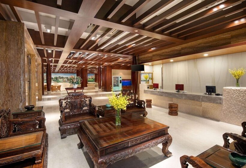 Hotel Ramada Encore By Wyndham Qionghai Downtown