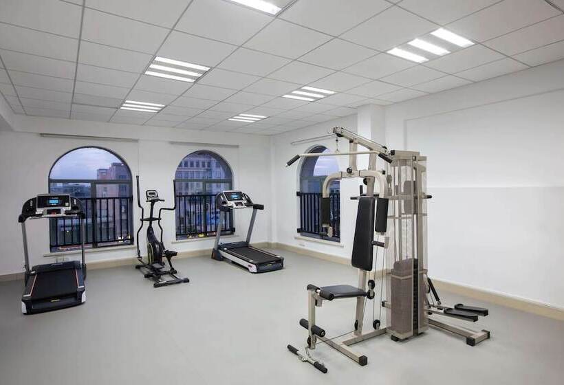 Hotel Ramada Encore By Wyndham Qionghai Downtown