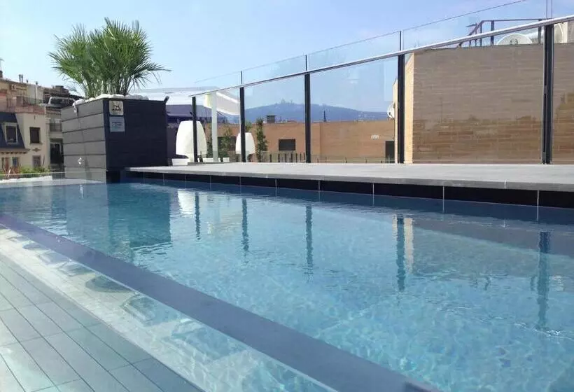 Отель Catalonia Eixample 1864