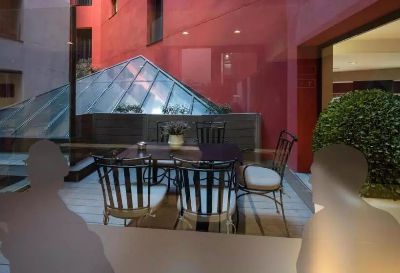 Отель Catalonia Eixample 1864