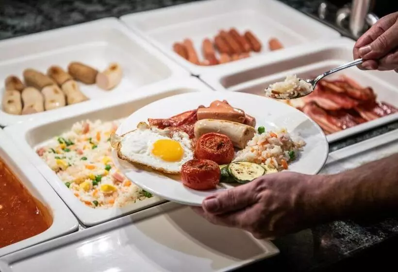 Отель Catalonia Eixample 1864