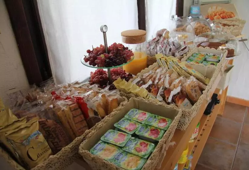 تختخواب و صبحانه Almà