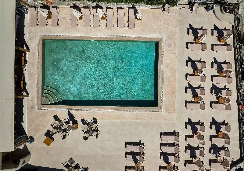 Отель Marni Village