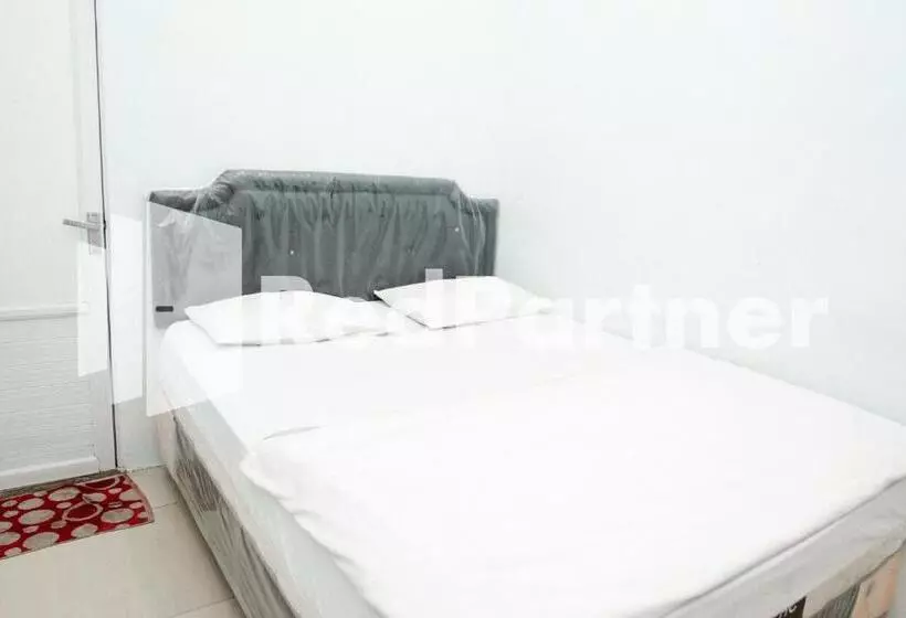 Majatalo Happy Inn Puspo Mitra Reddoorz