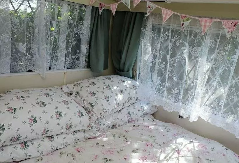 Kitty Unique 60s Caravan Set In Pretty Garden