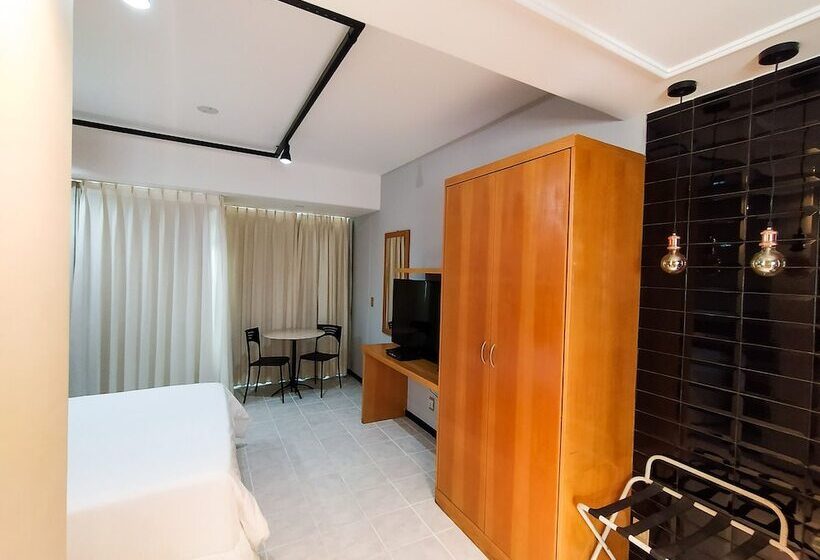 Отель Savassi Village