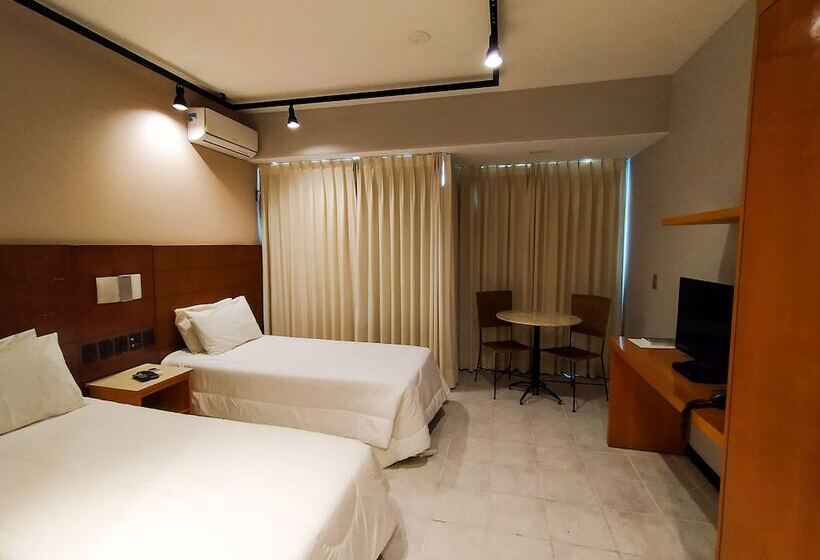 Отель Savassi Village