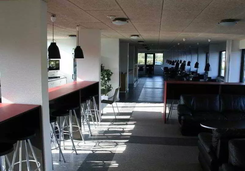 Отель Stop N Sleep