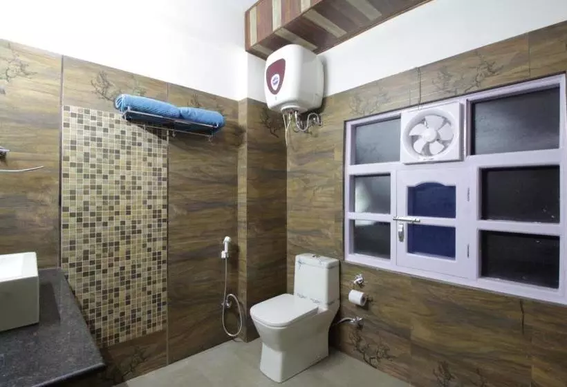 تختخواب و صبحانه Whispering Winds Villa