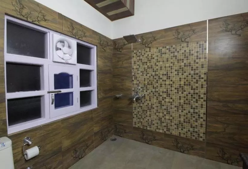 تختخواب و صبحانه Whispering Winds Villa