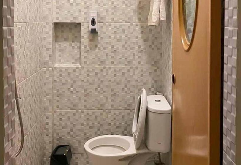 Отель Reddoorz @ Nantampukmas Sidikalang