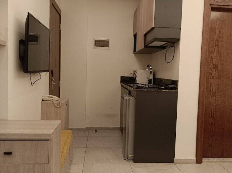 هتل Shade Suites And Studios