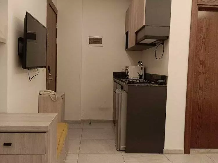 هتل Shade Suites And Studios