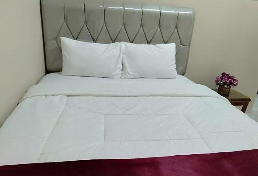 호텔 Oyo 90602 Guest House Marisa Syariah