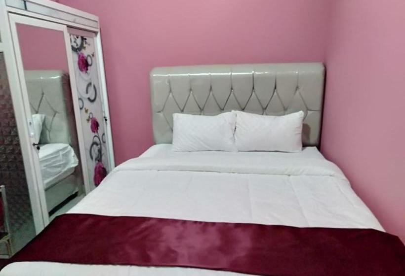 호텔 Oyo 90602 Guest House Marisa Syariah