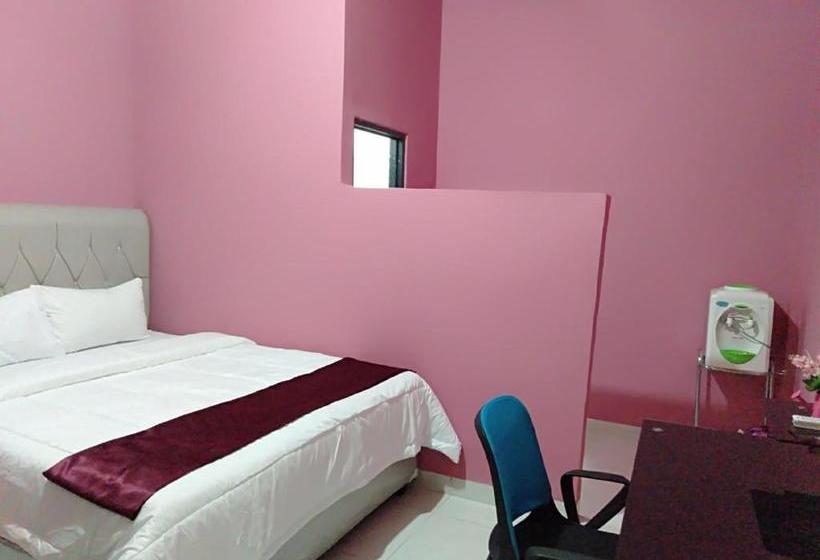 호텔 Oyo 90602 Guest House Marisa Syariah