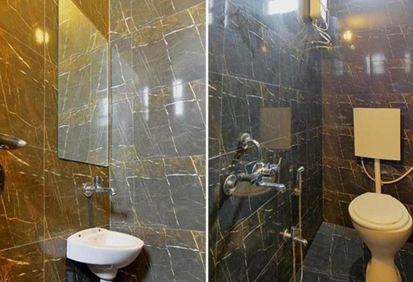 Fabhotel Tiru Residency