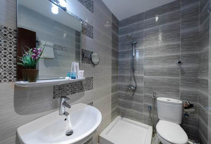 호텔 Holiday Plus Al Nuzha