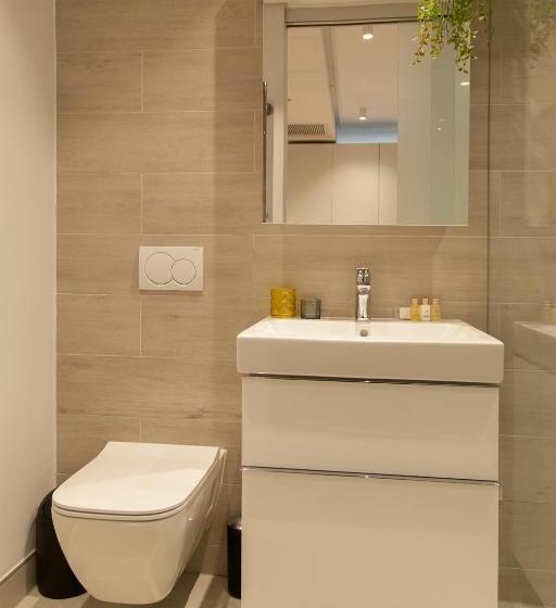 בית מלון כפרי 117 On Strand Luxury Apartments