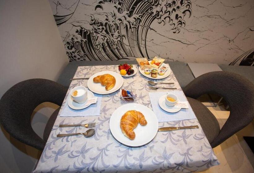 ホテル Odissea Residence E Rooms