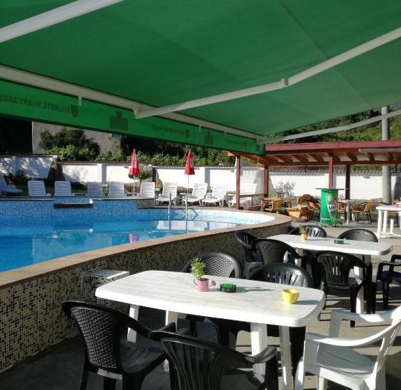 By The River Hotel Complex