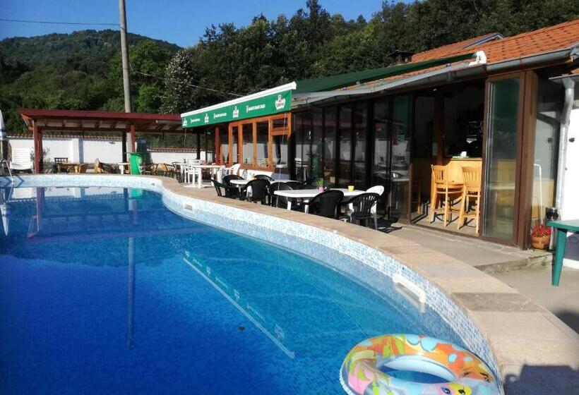 By The River Hotel Complex