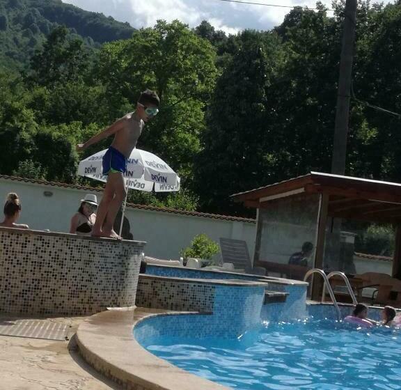 By The River Hotel Complex