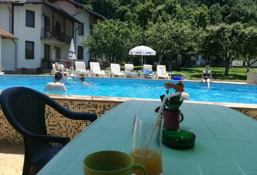 By The River Hotel Complex