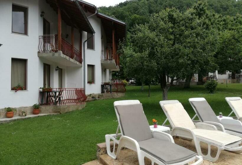 By The River Hotel Complex