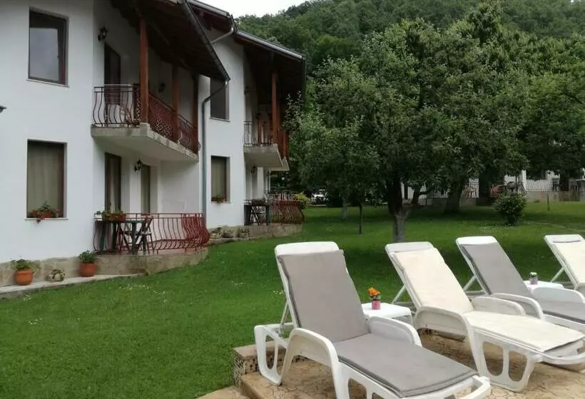 By The River Hotel Complex