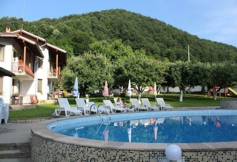 By The River Hotel Complex