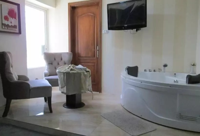 Excelencia Hotel Suites