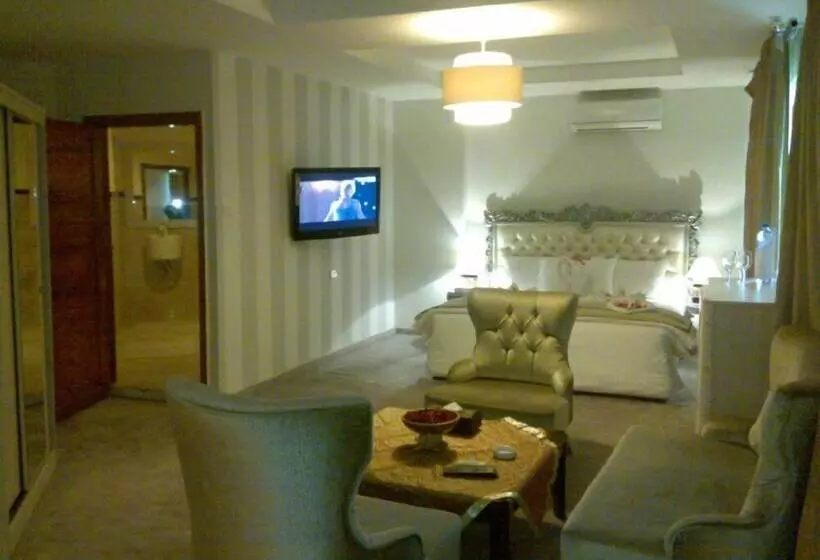 Excelencia Hotel Suites