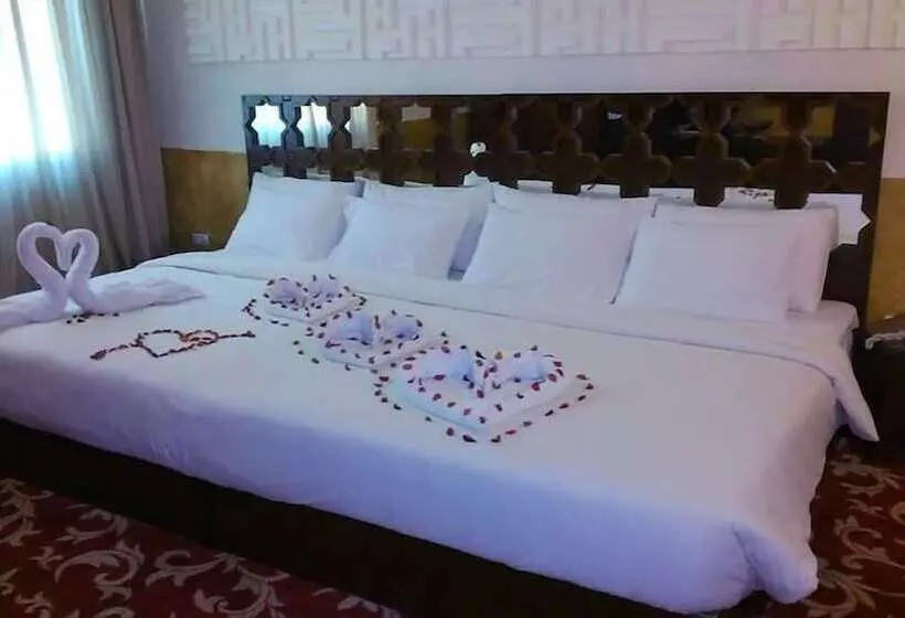 Excelencia Hotel Suites