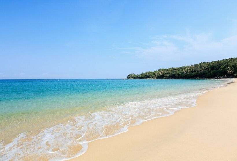 Отель The Surin Phuket