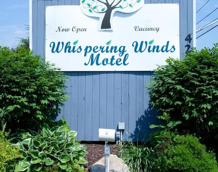 הוסטל Whispering Winds Motel