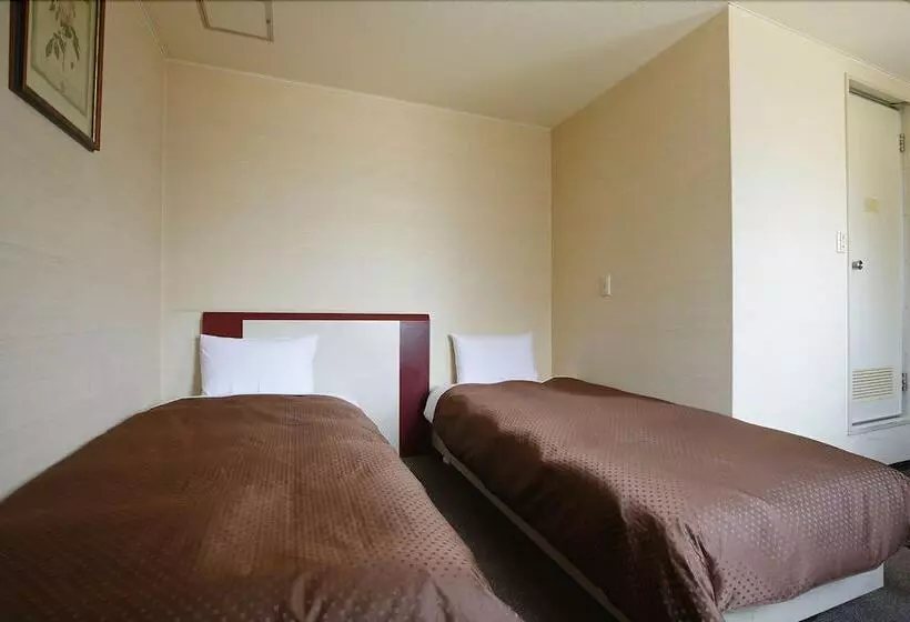 Отель Grampus Inn Osaka