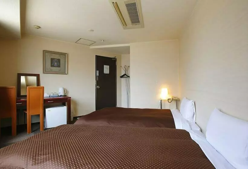 Отель Grampus Inn Osaka