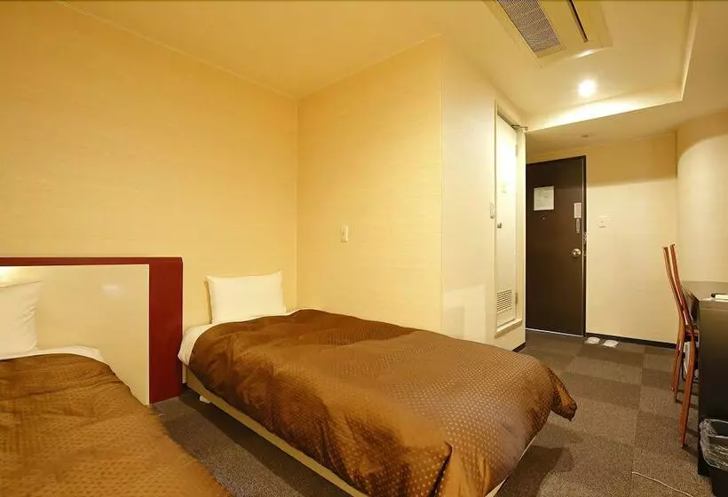 Отель Grampus Inn Osaka