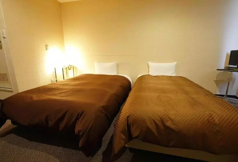 Отель Grampus Inn Osaka